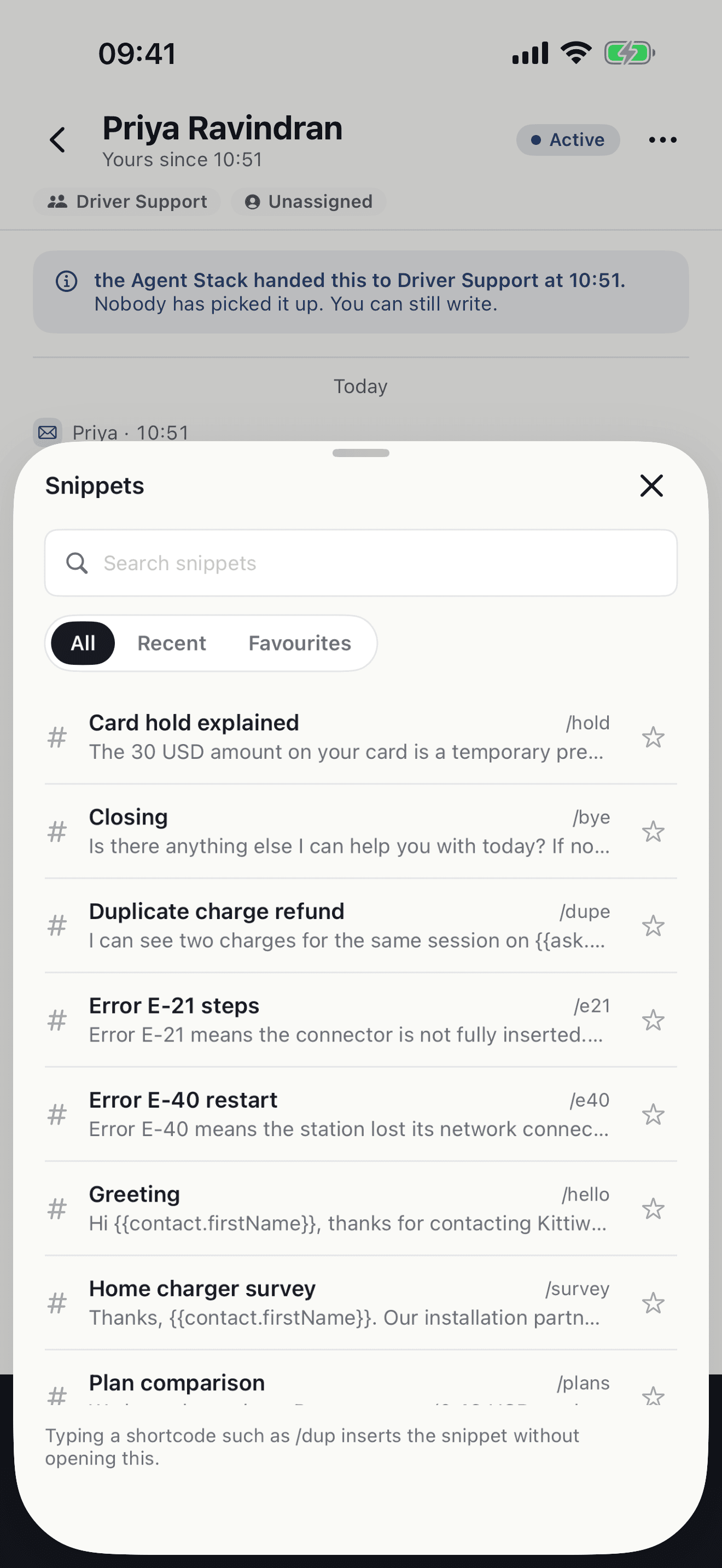 The snippet picker in the Atender iPhone app, with shortcodes and a search field.